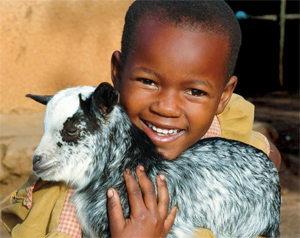 World Vision - child with goat