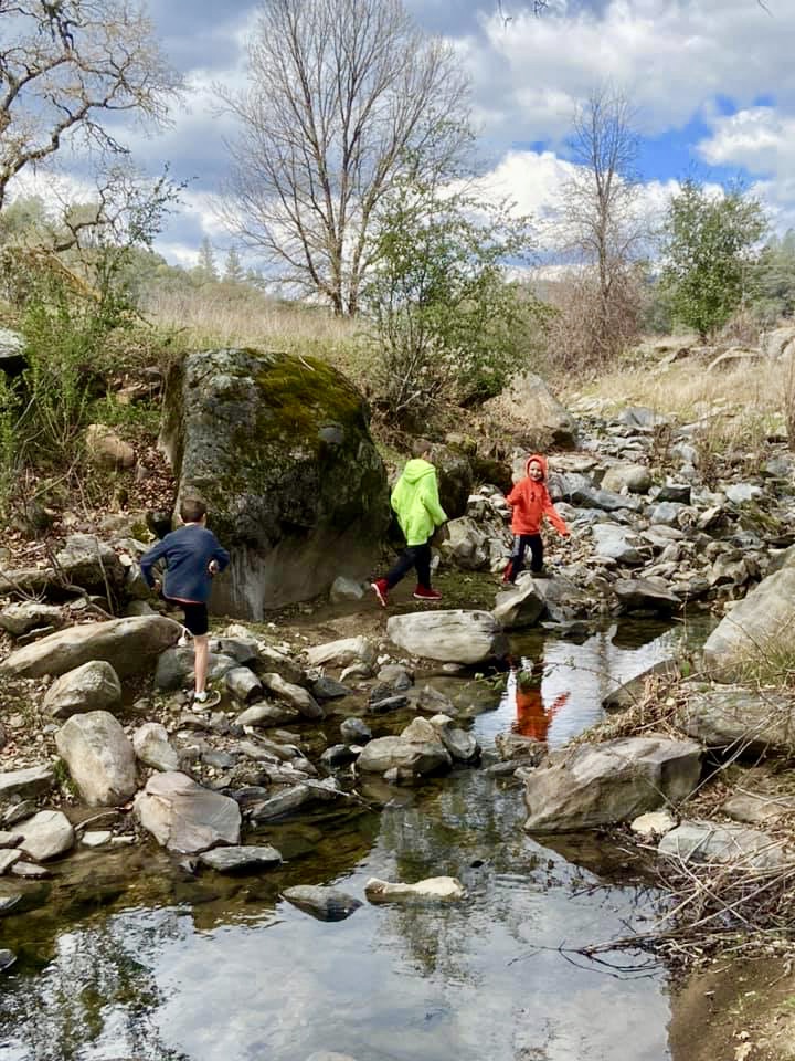 Kids hiking by Asbill Creek