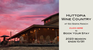 The sun is setting over Huttopia Wine Country at Six Sigma Ranch